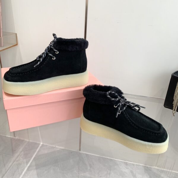 Miu Miu thick soled high top shoes
