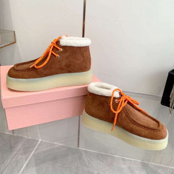 Miu Miu thick soled high top shoes