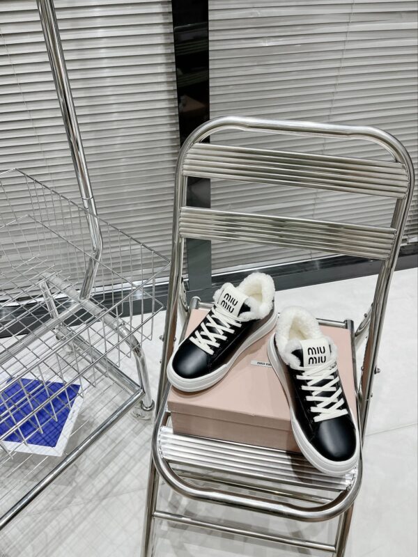 Miu Miu thick soled high top shoes
