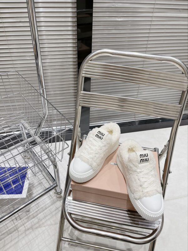 Miu Miu thick soled high top shoes
