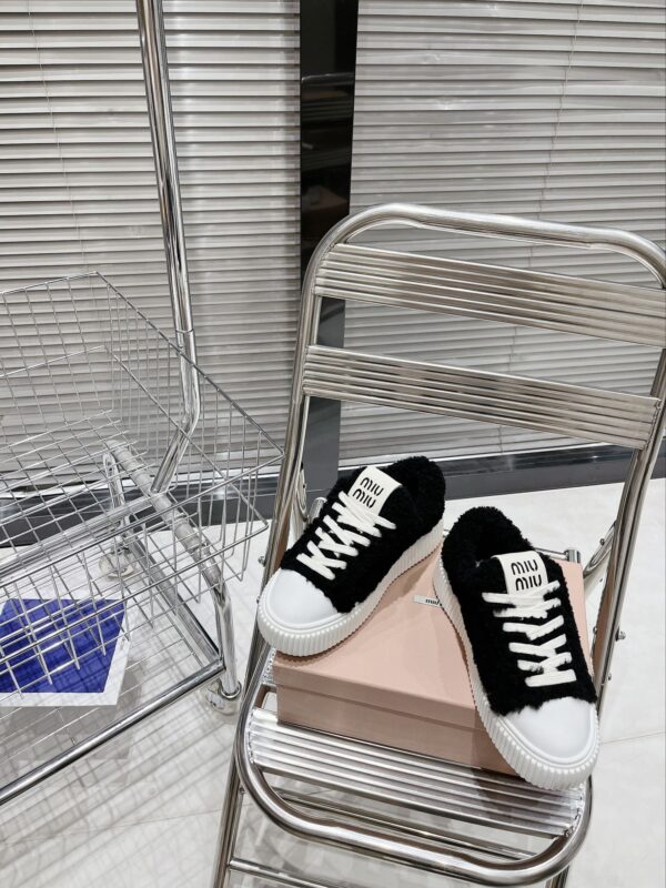 Miu Miu thick soled high top shoes