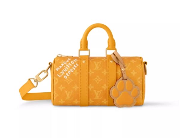 Louis Vuitton men's crossbody bag Keepall25 travel bag gold floral dog paw pendant